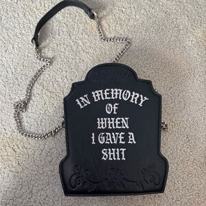 Dolls Kill TRICKZ N' TREATZ
NO CARES LEFT CROSSBODY BAG